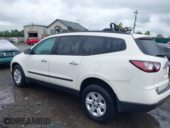 2015 Chevrolet Traverse LS z VIN 1GNKVFED4FJ197970, wystawiony jako IAAI lot #42020771 z przebiegiem 128 876 mil mil oraz . Historia ofert i sprzedaży dostępna na DreamBid. Obrazek 3.