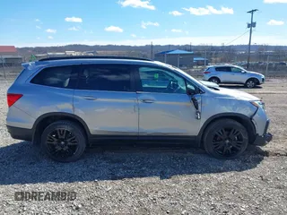 2021 Honda Pilot Special Edition with VIN 5FNYF6H20MB066095, listed as a IAAI auction lot 41863123 with 65,930 mi miles. Bid and sale history available at carsss.com. Image 13.