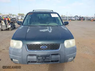 2003 Ford Escape XLT Popular 2 with VIN 1FMYU93113KE18944, listed as a IAAI auction lot 42056372 with 244,942 mi miles. Bid and sale history available at carsss.com. Image 6.