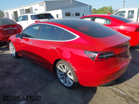 2018 Tesla Model 3 Long Range Battery with VIN 5YJ3E1EA5JF063555, listed as a IAAI auction lot 42028785 with 45,346 mi miles and . Bid and sale history available at DreamBid. Image 3.