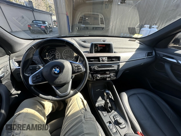 2017 BMW X1 xDrive28i with VIN WBXHT3C32H5F67896, listed as a IAAI auction lot 41823288 with 80,130 mi miles. Bid and sale history available at carsss.com. Image 10.