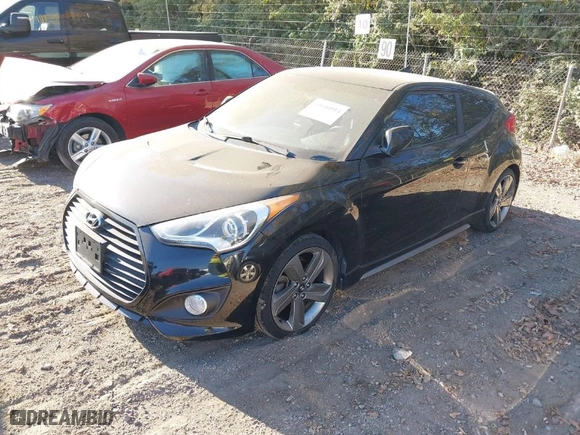2013 Hyundai Veloster Turbo w/Black Int with VIN KMHTC6AE6DU140694, listed as a IAAI auction lot 40646014 with 74,500 mi miles. Bid and sale history available at carsss.com. Image 2.