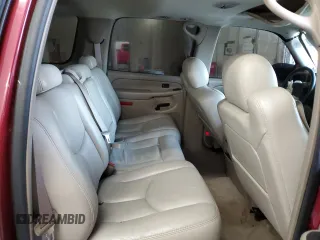 2004 Chevrolet Suburban Z71 z VIN 3GNFK16Z94G142386, wystawiony jako Copart lot #56150595 z przebiegiem 171 607 mil mil oraz Szkoda całkowita • Salvage title. Historia ofert i sprzedaży dostępna na DreamBid. Obrazek 11.