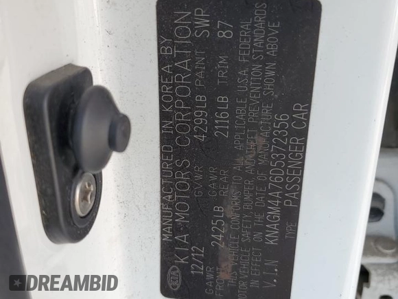 2013 Kia Optima LX z VIN KNAGM4A76D5372356, wystawiony jako Copart lot #57652125 z przebiegiem Nie podano mil oraz Szkoda całkowita • Salvage title. Historia ofert i sprzedaży dostępna na DreamBid. Obrazek 13.
