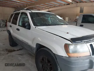 2000 Jeep Grand Cherokee Laredo with VIN 1J4G248S7YC363891, listed as a IAAI auction lot 42715393 with 238,686 mi miles and . Bid and sale history available at DreamBid. Image 1.