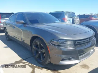 2018 Dodge Charger Daytona z VIN 2C3CDXCTXJH142390, wystawiony jako IAAI lot #41693738 z przebiegiem 122 435 mil mil oraz . Historia ofert i sprzedaży dostępna na DreamBid. Obrazek 1.