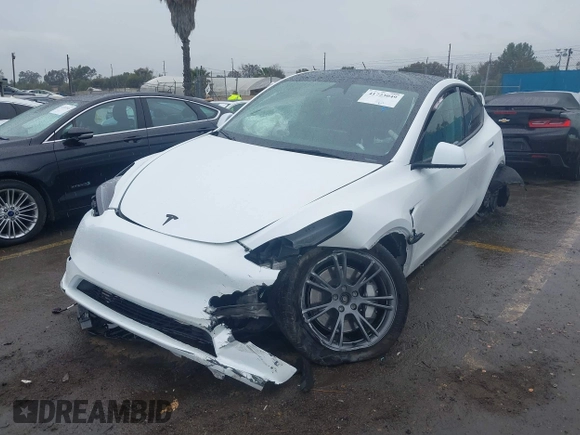 2024 Tesla Model Y Long Range z VIN 7SAYGDEEXRF230169, wystawiony jako IAAI lot #41723049 z przebiegiem Nie podano mil oraz . Historia ofert i sprzedaży dostępna na DreamBid. Obrazek 17.