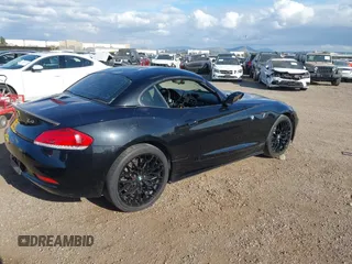 2012 BMW Z4 sDrive28i z VIN WBALL5C56CE716558, wystawiony jako IAAI lot #42065347 z przebiegiem 93 438 mil mil oraz . Historia ofert i sprzedaży dostępna na DreamBid. Obrazek 3.