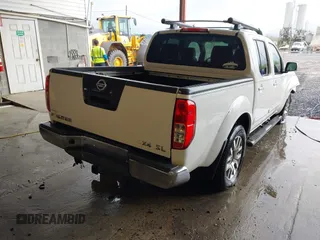 2011 Nissan Frontier Pro-4X with VIN 1N6AD0EV3BC409184, listed as a IAAI auction lot 42122823 with 209,669 mi miles and . Bid and sale history available at DreamBid. Image 4.