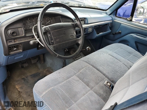 1994 Ford F-150 z VIN 1FTEF14NXRLA62582, wystawiony jako Copart lot #52379715 z przebiegiem 176 792 mil mil oraz Szkoda całkowita • Salvage title. Historia ofert i sprzedaży dostępna na DreamBid. Obrazek 8.