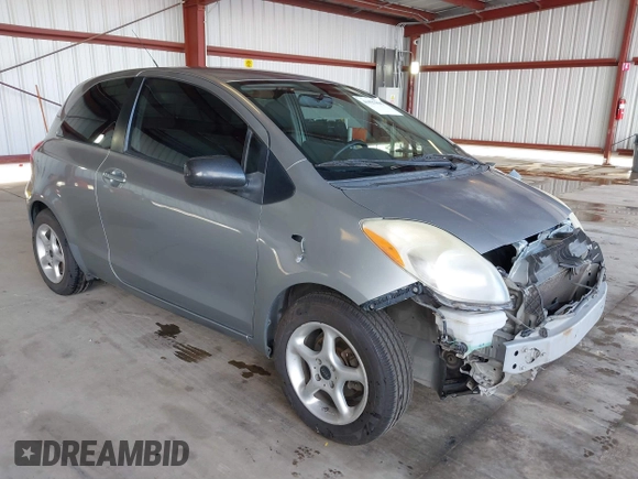 2009 Toyota Yaris with VIN JTDJT903095254673, listed as a IAAI auction lot 41830459 with 320,449 mi miles. Bid and sale history available at carsss.com. Image 1.