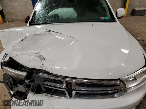 2018 Dodge Durango SXT with VIN 1C4RDJAG1JC315628, listed as a Copart auction lot 56653695 with 128,765 mi miles and Clean title. Bid and sale history available at DreamBid. Image 12.
