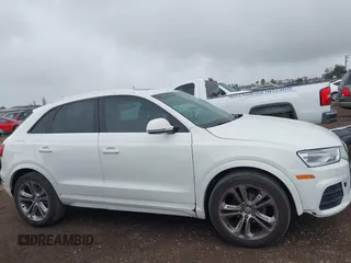 2016 Audi Q3 Premium Plus with VIN WA1BFCFS0GR009654, listed as a IAAI auction lot 42141372 with 138,992 mi miles. Bid and sale history available at carsss.com. Image 13.