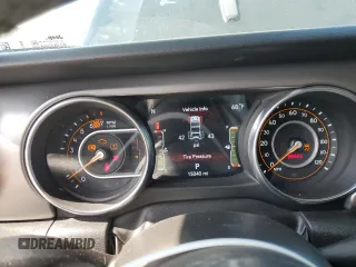 2023 Jeep Wrangler Willys with VIN 1C4HJXDG6PW663824, listed as a Copart auction lot 57761905 with 15,040 mi miles and Salvage title. Bid and sale history available at DreamBid. Image 9.