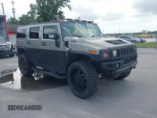 2003 Hummer H2 z VIN 5GRGN23U33H132071, wystawiony jako IAAI lot #42361347 z przebiegiem 207 310 mil mil oraz . Historia ofert i sprzedaży dostępna na DreamBid. Obrazek 1.