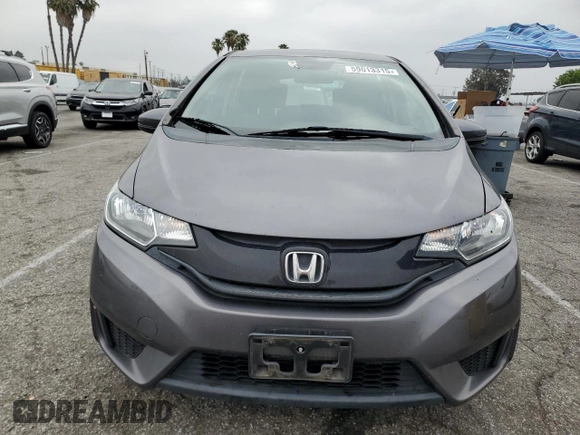 2015 Honda Fit LX z VIN 3HGGK5H58FM785137, wystawiony jako Copart lot #59013315 z przebiegiem 84 592 mil mil oraz Szkoda całkowita • Salvage title. Historia ofert i sprzedaży dostępna na DreamBid. Obrazek 5.