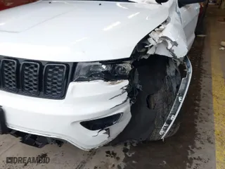 2019 Jeep Grand Cherokee Laredo E with VIN 1C4RJFAG1KC818289, listed as a IAAI auction lot 41602541 with 59,356 mi miles. Bid and sale history available at carsss.com. Image 20.