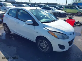 2012 Mazda Mazda2 Sport with VIN JM1DE1KZ1C0147422, listed as a IAAI auction lot 41742912 with 84,269 mi miles. Bid and sale history available at carsss.com. Image 1.