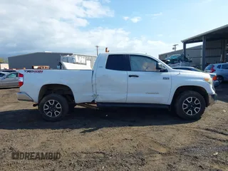 2014 Toyota Tundra 4WD Truck SR with VIN 5TFUY5F1XEX385475, listed as a IAAI auction lot 41563188 with 135,310 mi miles. Bid and sale history available at carsss.com. Image 13.