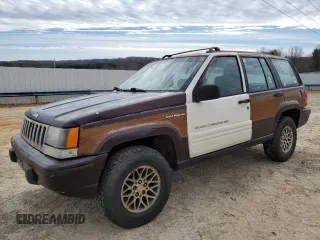 1993 Jeep Grand Wagoneer z VIN 1J4GZ88Y6PC711184, wystawiony jako Copart lot #46785895 z przebiegiem 280 127 mil mil oraz Czysty tytuł • Clean title. Historia ofert i sprzedaży dostępna na DreamBid. Obrazek 1.