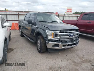 2019 Ford F-150 XL with VIN 1FTEW1CBXKKC92920, listed as a IAAI auction lot 41543793 with 147,986 mi miles and . Bid and sale history available at carsss.com. Image 1.