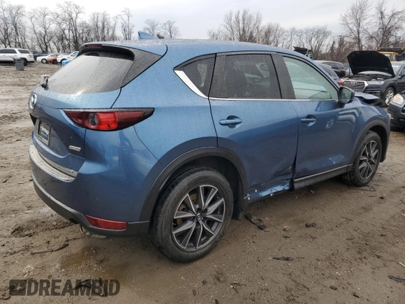 2018 Mazda CX-5 Touring with VIN JM3KFBCM0J0363036, listed as a Copart auction lot 47085755 with 61,928 mi miles and Salvage Title. Bid and sale history available at DreamBid. Image 3.
