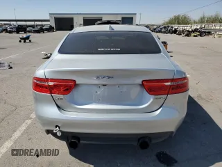 2019 Jaguar XE 25t with VIN SAJAR4FX6KCP49670, listed as a Copart auction lot 75340594 with 71,282 mi miles and Salvage Title. Bid and sale history available at carsss.com. Image 6.