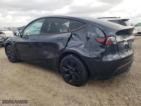 2024 Tesla Model Y with VIN 7SAYGDED8RA330470, listed as a Copart auction lot 43923975 with 4,223 mi miles and Salvage Title. Bid and sale history available at carsss.com. Image 2.