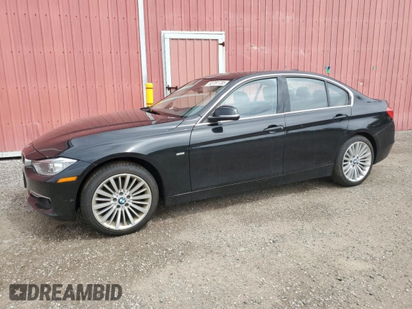 2012 BMW 3 Series 328i with VIN WBA3A5C57CF345040, listed as a Copart auction lot 63761735 with 106,665 mi miles and Clean title. Bid and sale history available at DreamBid. Image 1.