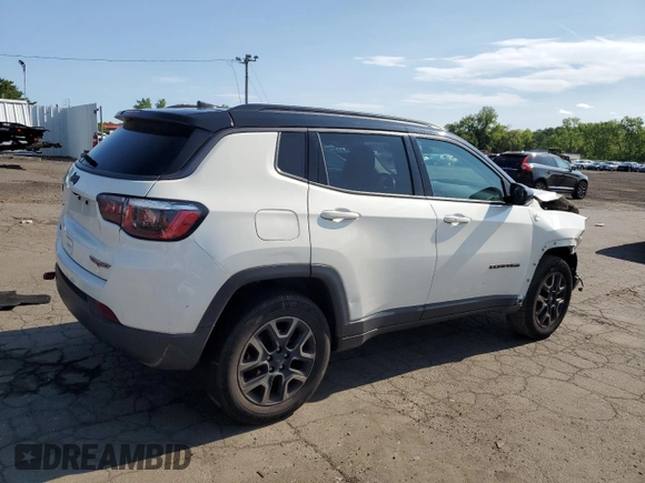 2019 Jeep Compass Trailhawk with VIN 3C4NJDDBXKT671249, listed as a Copart auction lot 58927225 with Not provided miles and Salvage title. Bid and sale history available at DreamBid. Image 3.