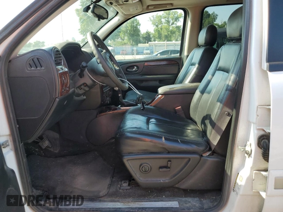 2005 GMC Envoy SLT with VIN 1GKDT13S852185958, listed as a Copart auction lot 68736194 with 225,398 mi miles and Salvage Title. Bid and sale history available at DreamBid. Image 7.