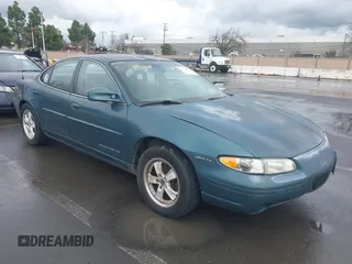 1997 Pontiac Grand Prix SE with VIN 1G2WJ52K0VF249961, listed as a IAAI auction lot 41512770 with 168,408 mi miles. Bid and sale history available at carsss.com. Image 1.