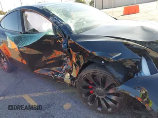 2022 Tesla Model Y Performance with VIN 7SAYGDEF5NF336693, listed as a IAAI auction lot 41805752 with 42,009 mi miles and . Bid and sale history available at DreamBid. Image 6.