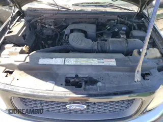 1997 Ford F-150 XL z VIN 1FTEX17L8VNB84878, wystawiony jako Copart lot #52695045 z przebiegiem 446 498 mil mil oraz Szkoda całkowita • Salvage title. Historia ofert i sprzedaży dostępna na DreamBid. Obrazek 11.