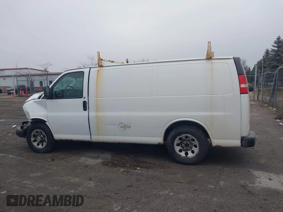2012 Chevrolet Express Cargo Van with VIN 1GCSGAFX4C1115813, listed as a IAAI auction lot 41197972 with 331,376 mi miles. Bid and sale history available at carsss.com. Image 14.