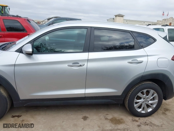 2019 Hyundai Tucson Value with VIN KM8J33A48KU927012, listed as a IAAI auction lot 41515397 with 62,501 mi miles. Bid and sale history available at carsss.com. Image 14.