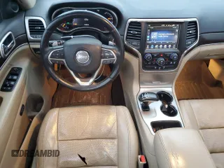 2014 Jeep Grand Cherokee Limited with VIN 1C4RJEBT5EC213332, listed as a Copart auction lot 87583515 with 152,409 mi miles and Salvage Title. Bid and sale history available at DreamBid. Image 8.