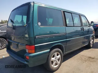 2003 Volkswagen EuroVan с VIN WV2KB47043H001319, выставлен на аукционе Copart как лот 73758024 с пробегом 88 497 миль миль и Чистый • Clean title. История ставок и продаж доступна на DreamBid. Изображение 3.