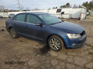 2014 Volkswagen Jetta SE с VIN 3VWD17AJ9EM400347, выставлен на аукционе Copart как лот 88554635 с пробегом 128 373 миль миль и Списание • Salvage title. История ставок и продаж доступна на DreamBid. Изображение 4.