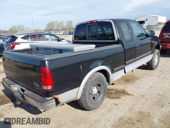 1997 Ford F-150 XL with VIN 1FTDX18W6VKD46643, listed as a IAAI auction lot 42111129 with 107,025 mi miles. Bid and sale history available at carsss.com. Image 4.