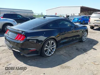 2021 Ford Mustang GT z VIN 1FA6P8CFXM5156002, wystawiony jako IAAI lot #42009222 z przebiegiem 65 939 mil mil oraz . Historia ofert i sprzedaży dostępna na DreamBid. Obrazek 4.