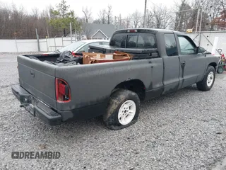 1999 Dodge Dakota SLT z VIN 1B7GL22X3XS181329, wystawiony jako IAAI lot #41480264 z przebiegiem 227 616 mil mil oraz . Historia ofert i sprzedaży dostępna na DreamBid. Obrazek 4.