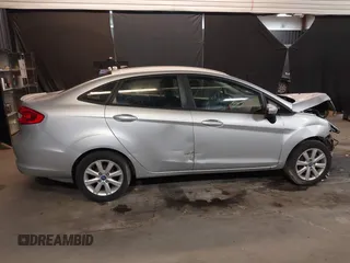 2012 Ford Fiesta SE with VIN 3FADP4BJ1CM110315, listed as a IAAI auction lot 39266357 with 144,749 mi miles. Bid and sale history available at carsss.com. Image 13.