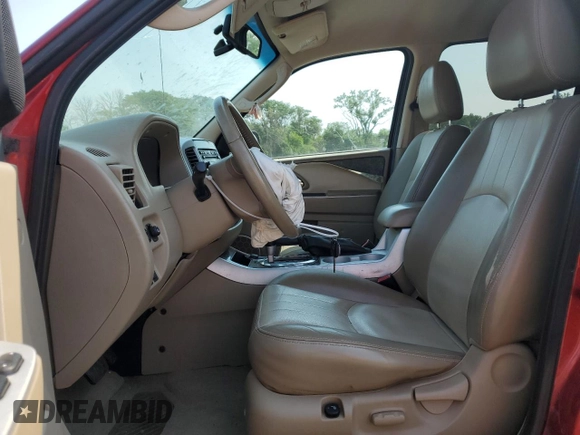 2006 Mercury Mariner Luxury with VIN 4M2YU57146KJ07465, listed as a Copart auction lot 62532264 with 126,009 mi miles and Salvage title. Bid and sale history available at DreamBid. Image 7.
