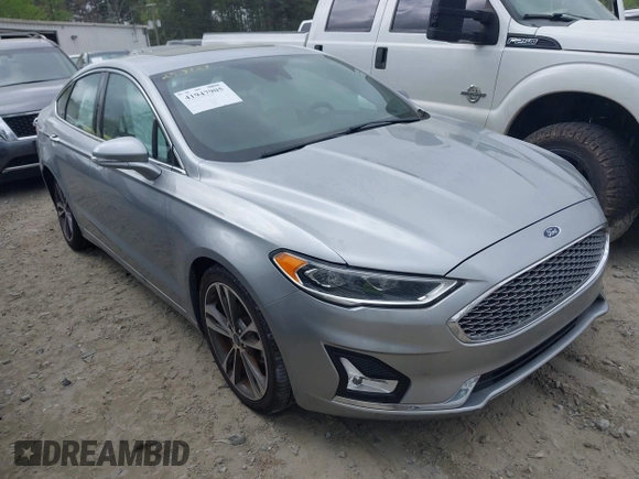 2020 Ford Fusion Titanium с VIN 3FA6P0K91LR128016, выставлен на аукционе IAAI как лот 41947905 с пробегом 79 622 миль миль и . История ставок и продаж доступна на DreamBid. Изображение 1.
