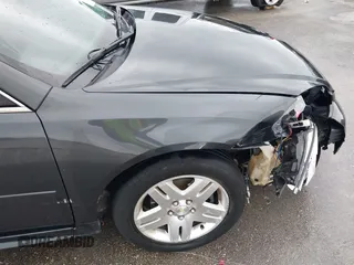 2013 Chevrolet Impala LT with VIN 2G1WG5E31D1106515, listed as a IAAI auction lot 42166897 with 126,431 mi miles and . Bid and sale history available at DreamBid. Image 6.
