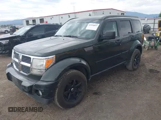 2010 Dodge Nitro SE z VIN 1D4PU2GK4AW125087, wystawiony jako IAAI lot #42554853 z przebiegiem 82 282 mil mil oraz . Historia ofert i sprzedaży dostępna na DreamBid. Obrazek 2.