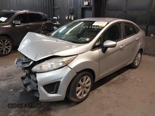2012 Ford Fiesta SE with VIN 3FADP4BJ1CM110315, listed as a IAAI auction lot 39266357 with 144,749 mi miles. Bid and sale history available at carsss.com. Image 18.