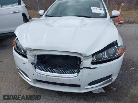 2015 Jaguar XF V6 Portfolio with VIN SAJWA0F7XF8U88039, listed as a IAAI auction lot 41459904 with 83,927 mi miles. Bid and sale history available at carsss.com. Image 6.