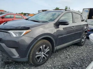 2017 Toyota RAV4 LE with VIN 2T3BFREV2HW670639, listed as a Copart auction lot 60017335 with 100,299 mi miles and Salvage title. Bid and sale history available at DreamBid. Image 1.